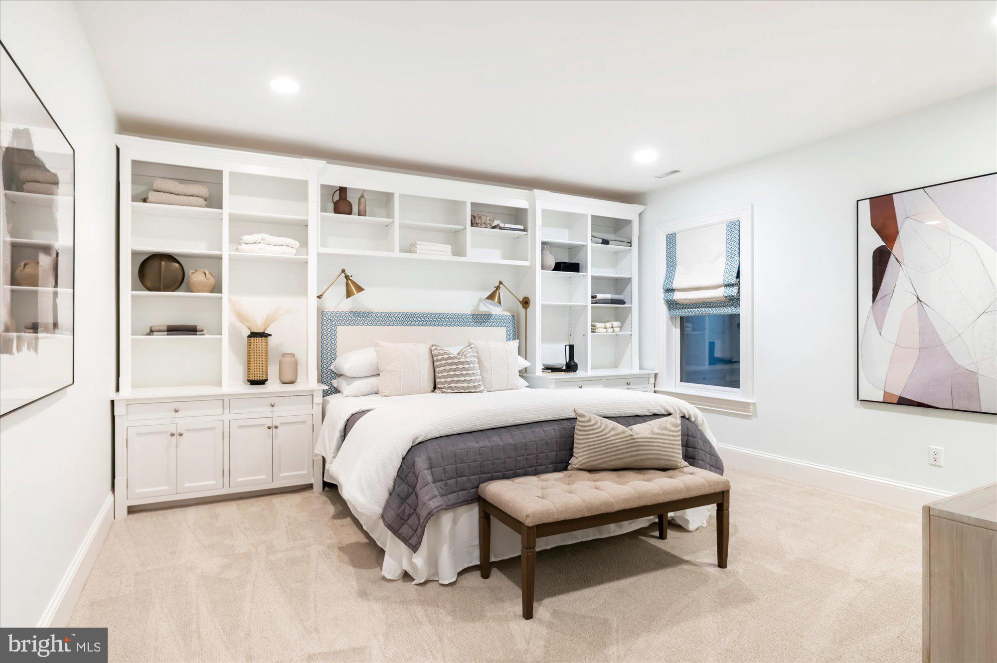 2950 Chain Bridge Road Northwest Washington, DC 20016 - Photo 37 of 50 a spacious bedroom with a bed and a cabinets