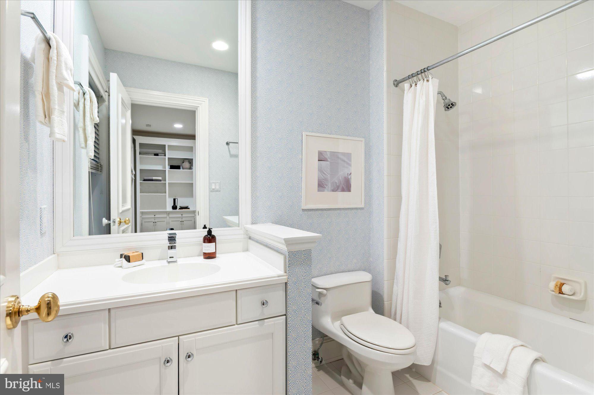 2950 Chain Bridge Road Northwest Washington, DC 20016 - Photo 38 of 50 a bathroom with a sink toilet tub and shower