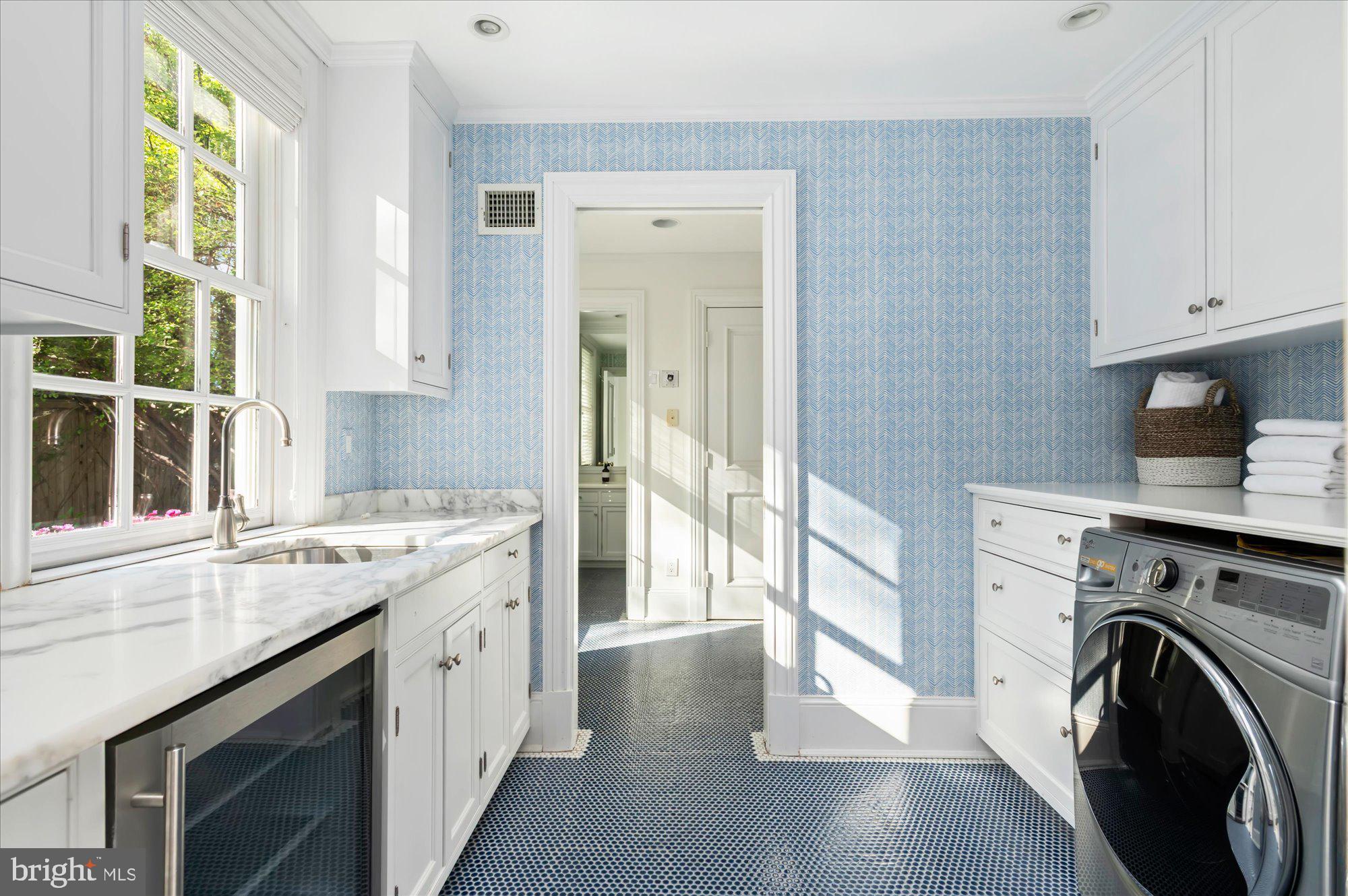 2950 Chain Bridge Road Northwest Washington, DC 20016 - Photo 40 of 50 a view of a kitchen with a sink dryer and washer