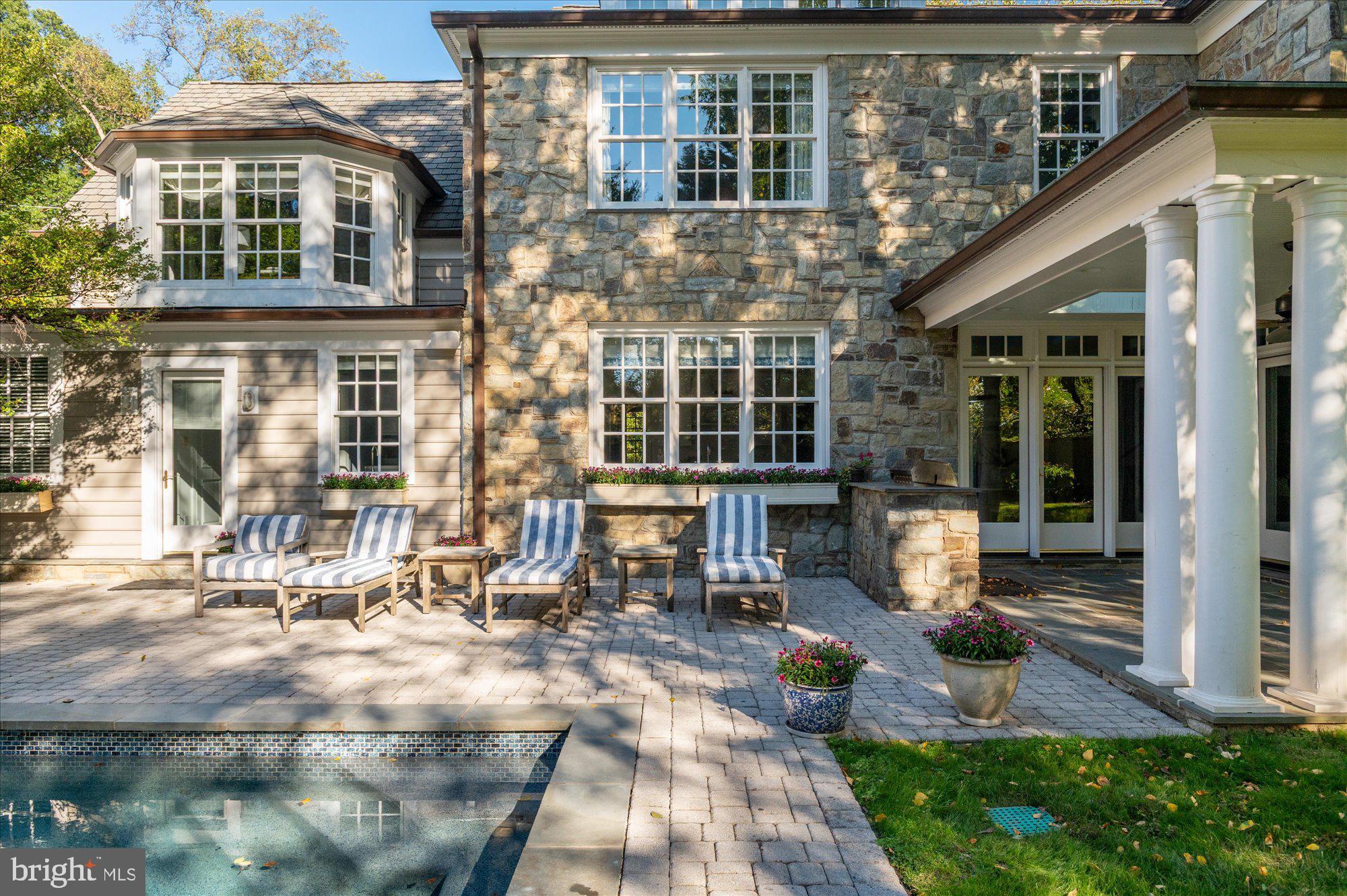 2950 Chain Bridge Road Northwest Washington, DC 20016 - Photo 43 of 50 a front view of a building with sitting area