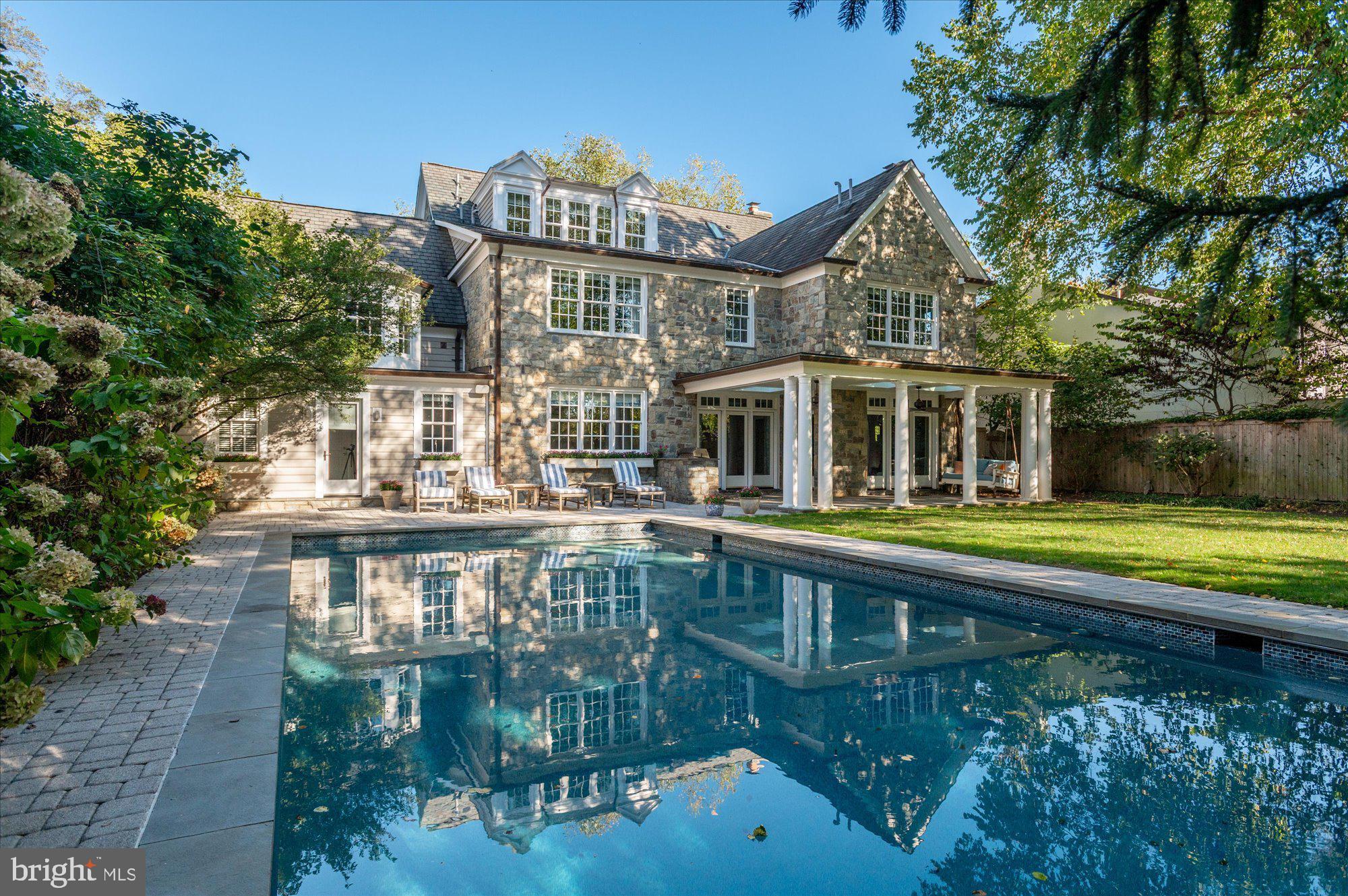 2950 Chain Bridge Road Northwest Washington, DC 20016 - Photo 44 of 50 a view of a building with a swimming pool