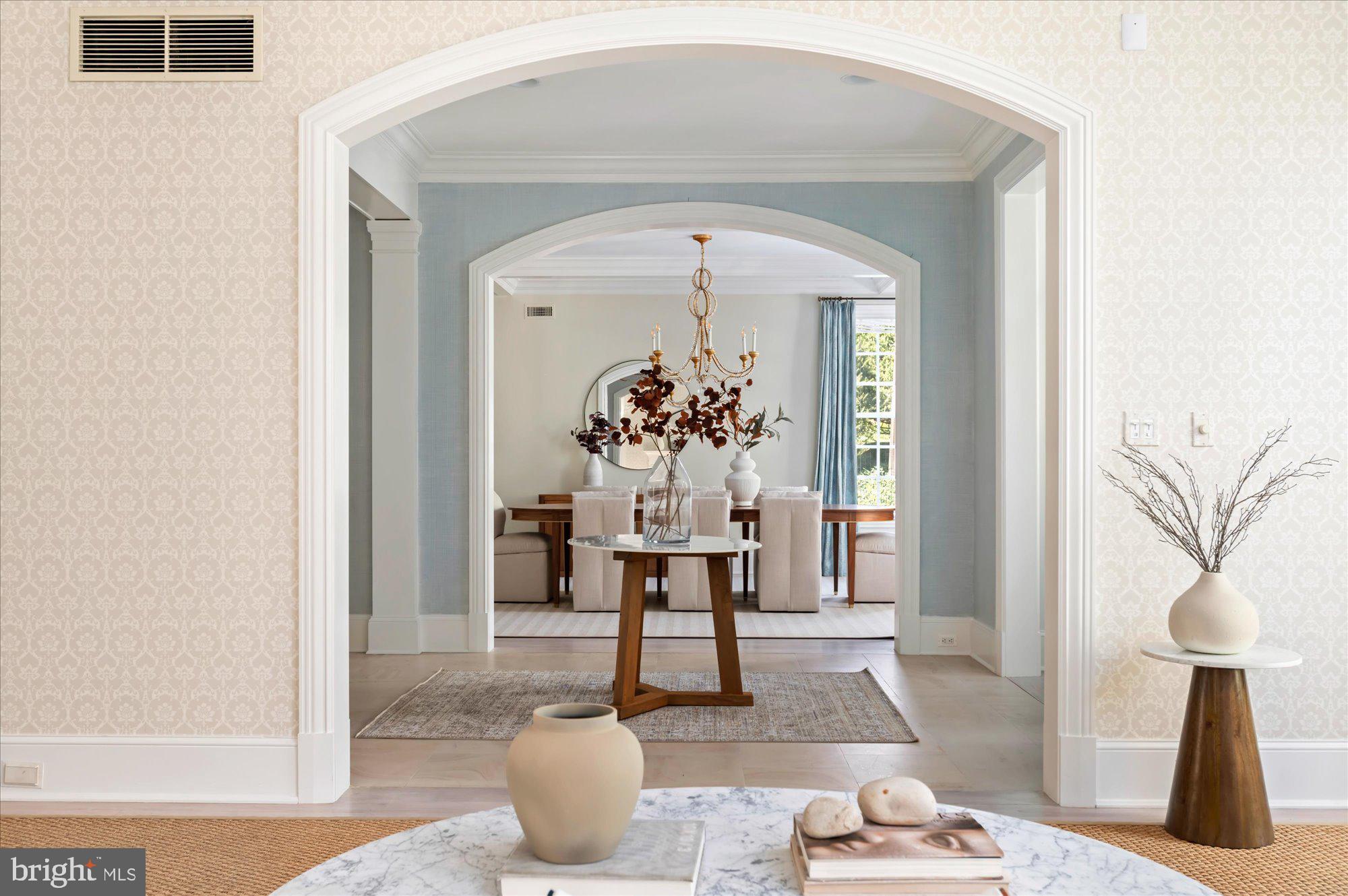 2950 Chain Bridge Road Northwest Washington, DC 20016 - Photo 7 of 50 a living room with furniture and a chandelier