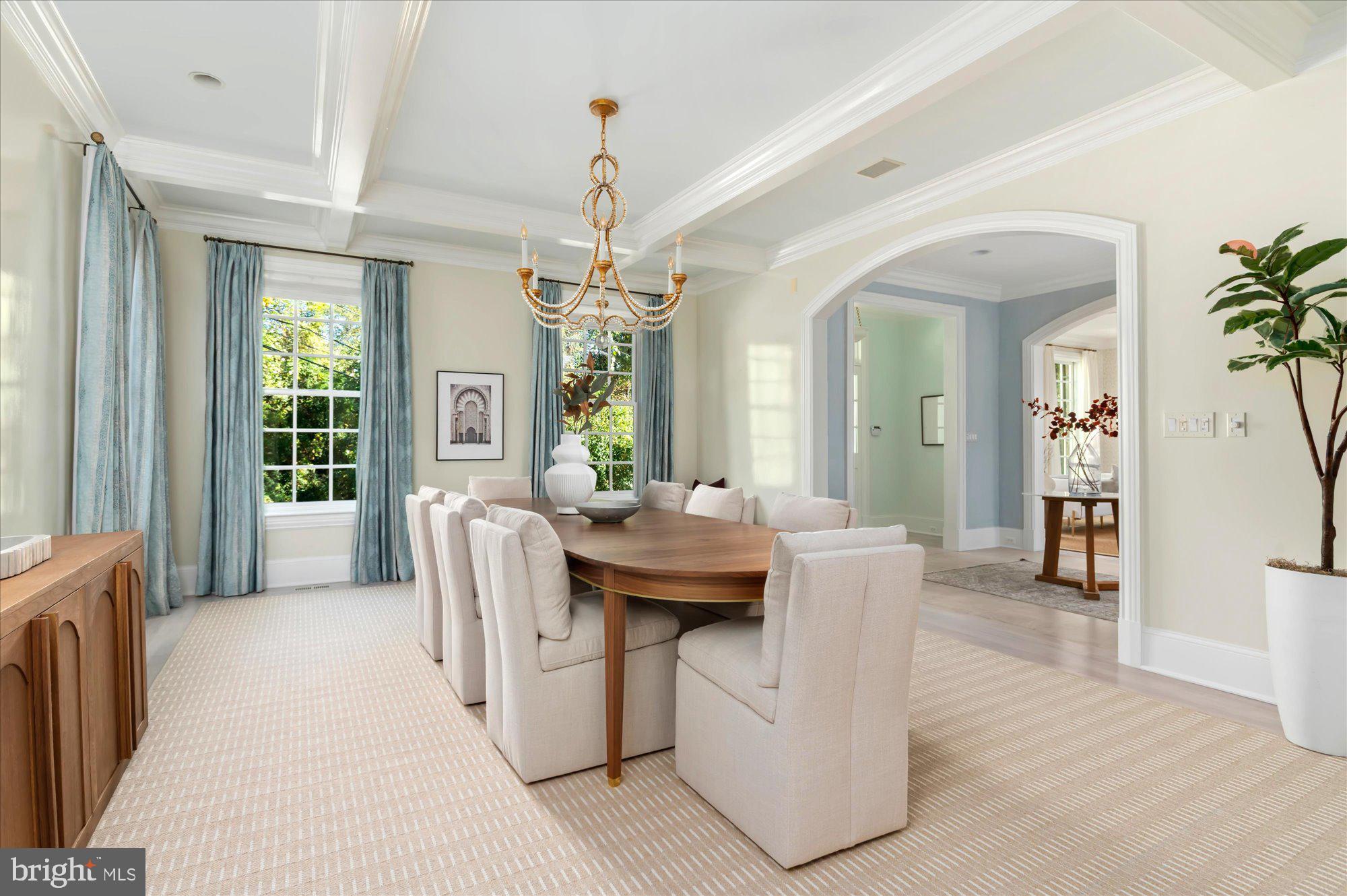 2950 Chain Bridge Road Northwest Washington, DC 20016 - Photo 8 of 50 a living room with furniture and a chandelier