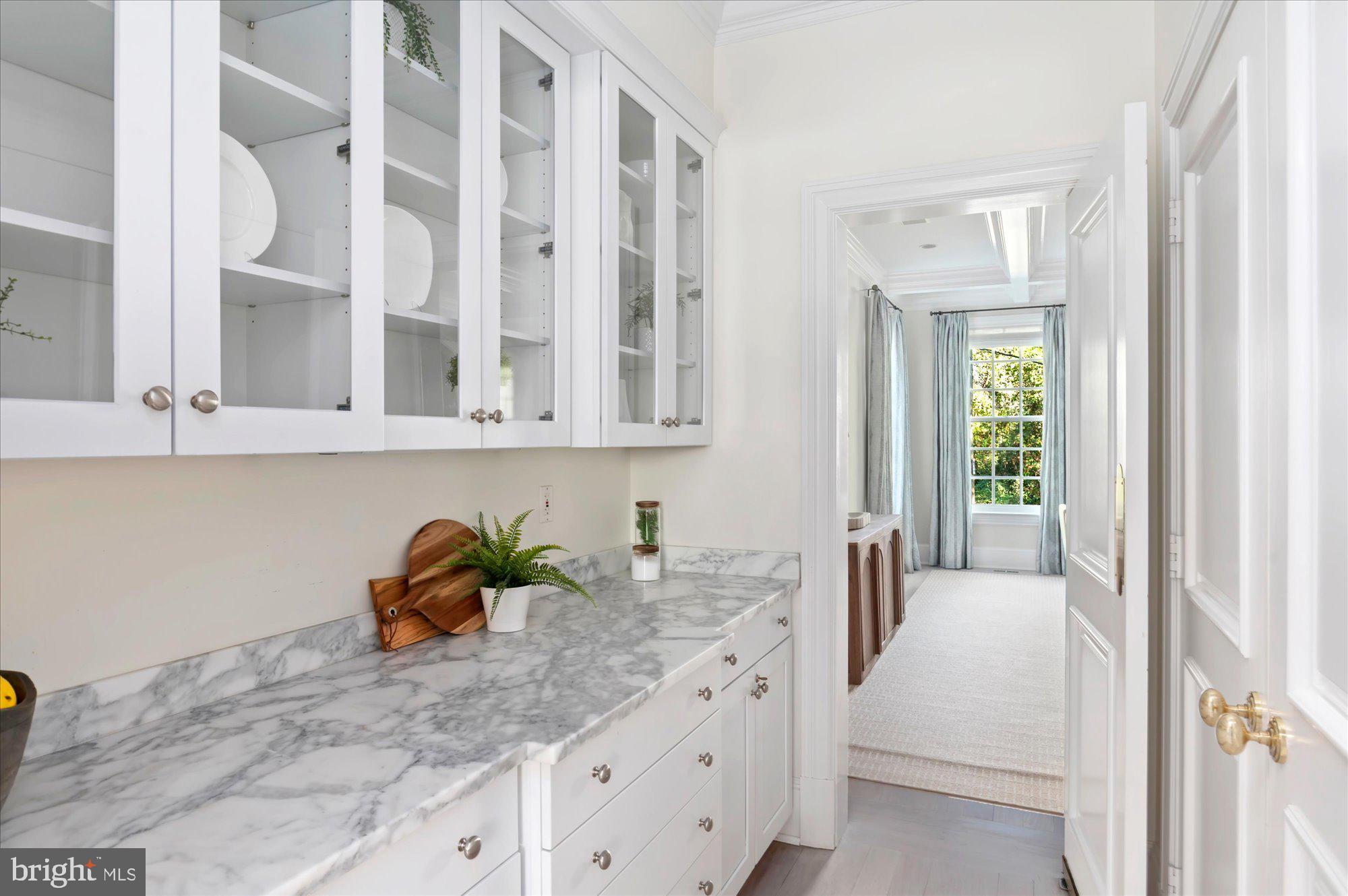 2950 Chain Bridge Road Northwest Washington, DC 20016 - Photo 10 of 50 a bathroom with a granite countertop sink