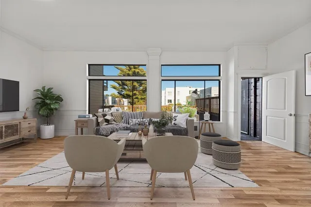 a dining room with furniture and wooden floor