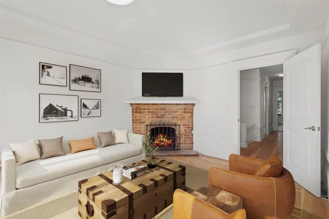 a living room with furniture or fireplace and a flat screen tv