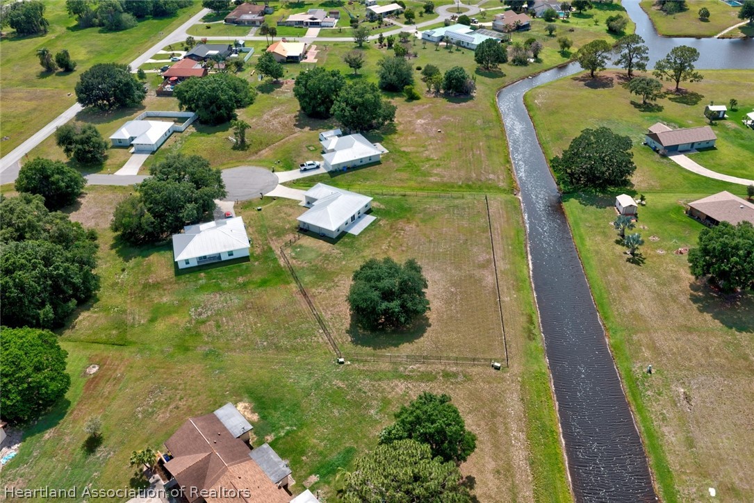 111 Vale Court Sebring, FL 33876 - Photo 36 of 40 an aerial view of a house with yard swimming pool and outdoor seating