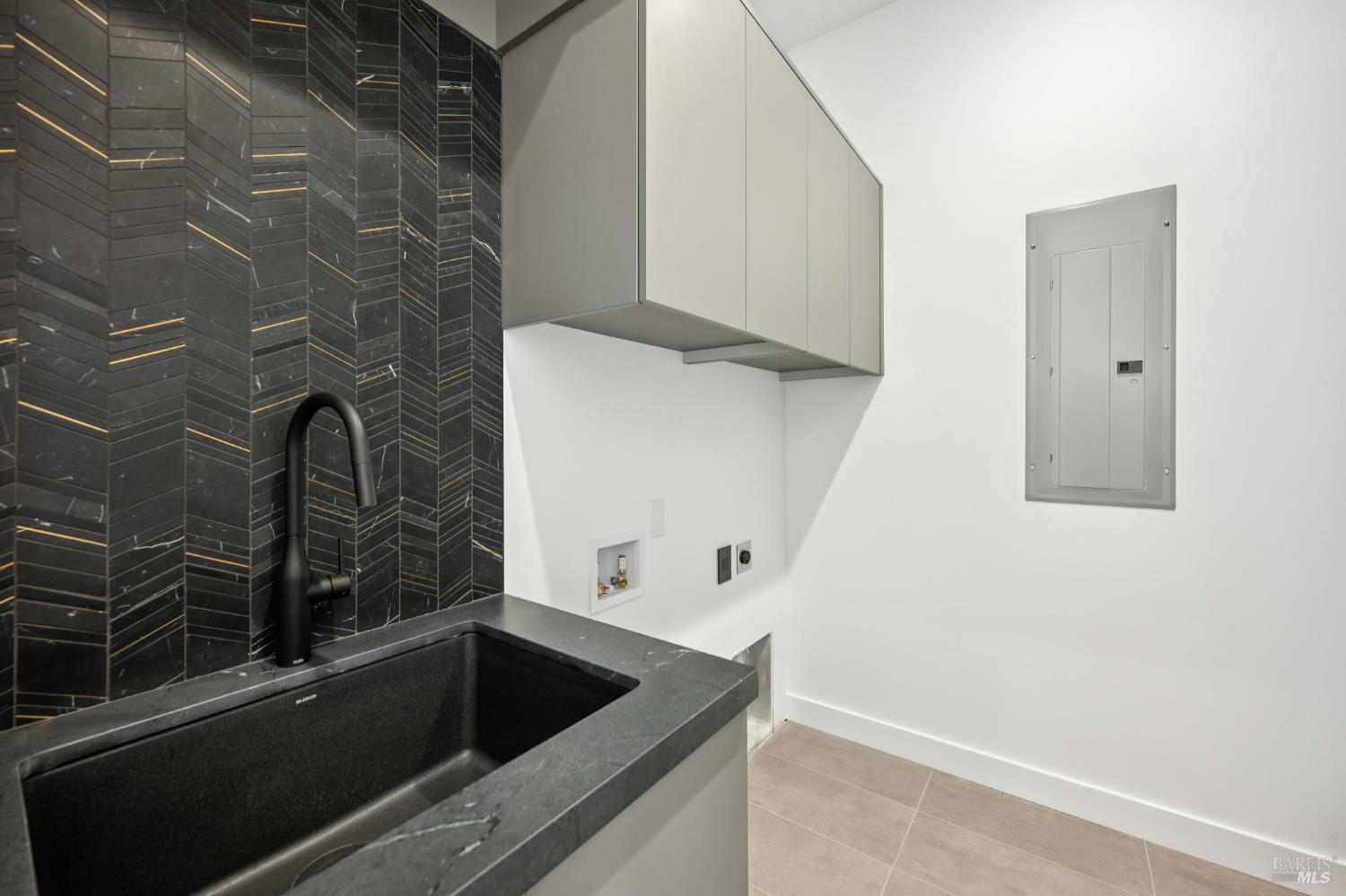 2156 Wedgewood Way Santa Rosa, CA 95404 - Photo 47 of 70 The primary laundry room offers abundant storage.