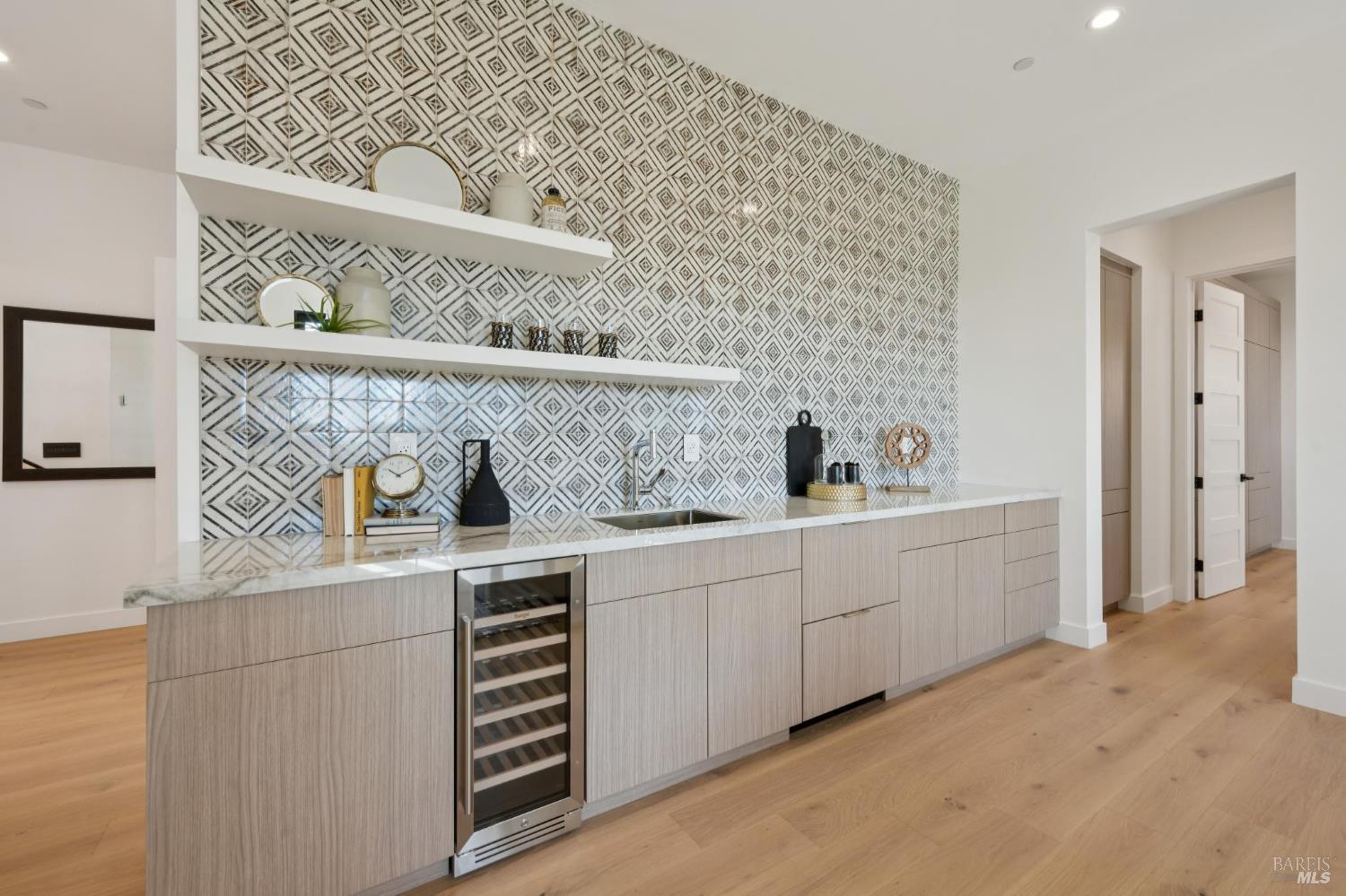 2156 Wedgewood Way Santa Rosa, CA 95404 - Photo 58 of 70 A custom entertaining center offers wine fridge and two beverage drawers and ample storage.