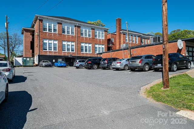 a view of a building with a street