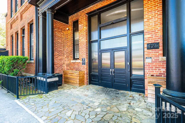 a front view of a house with a garage
