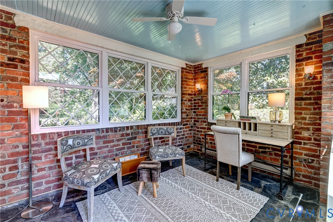 4814 Riverside Drive Richmond, VA 23225 - Photo 13 of 39 a dining room with furniture and large windows