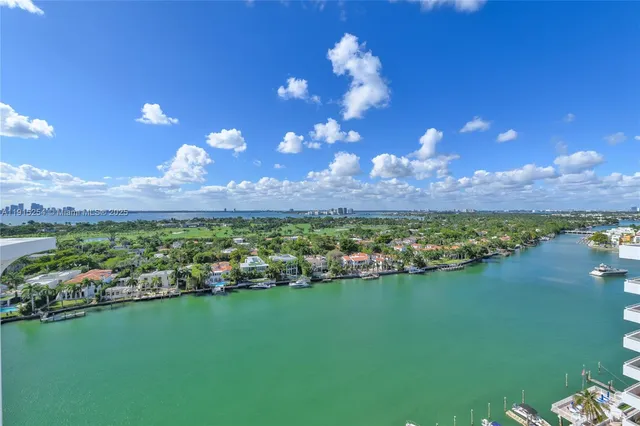 a view of a golf course with a lake
