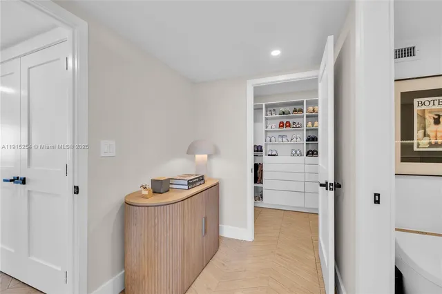 a room with furniture a rug and a window