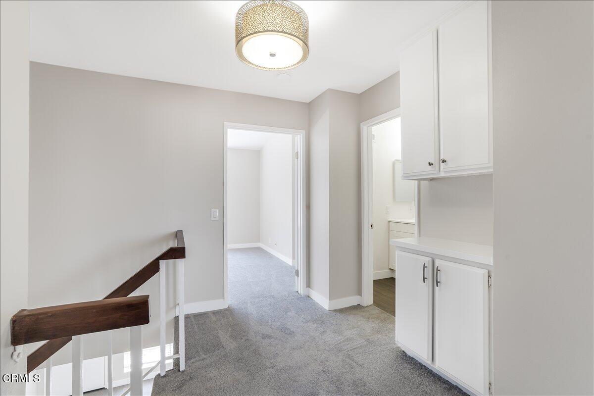 5147 Perkins Road Oxnard, CA 93033 - Photo 20 of 42 a view of an empty room with wooden floor