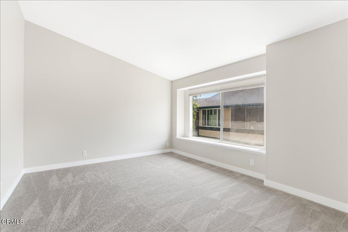 5147 Perkins Road Oxnard, CA 93033 - Photo 28 of 42 an empty room with a window