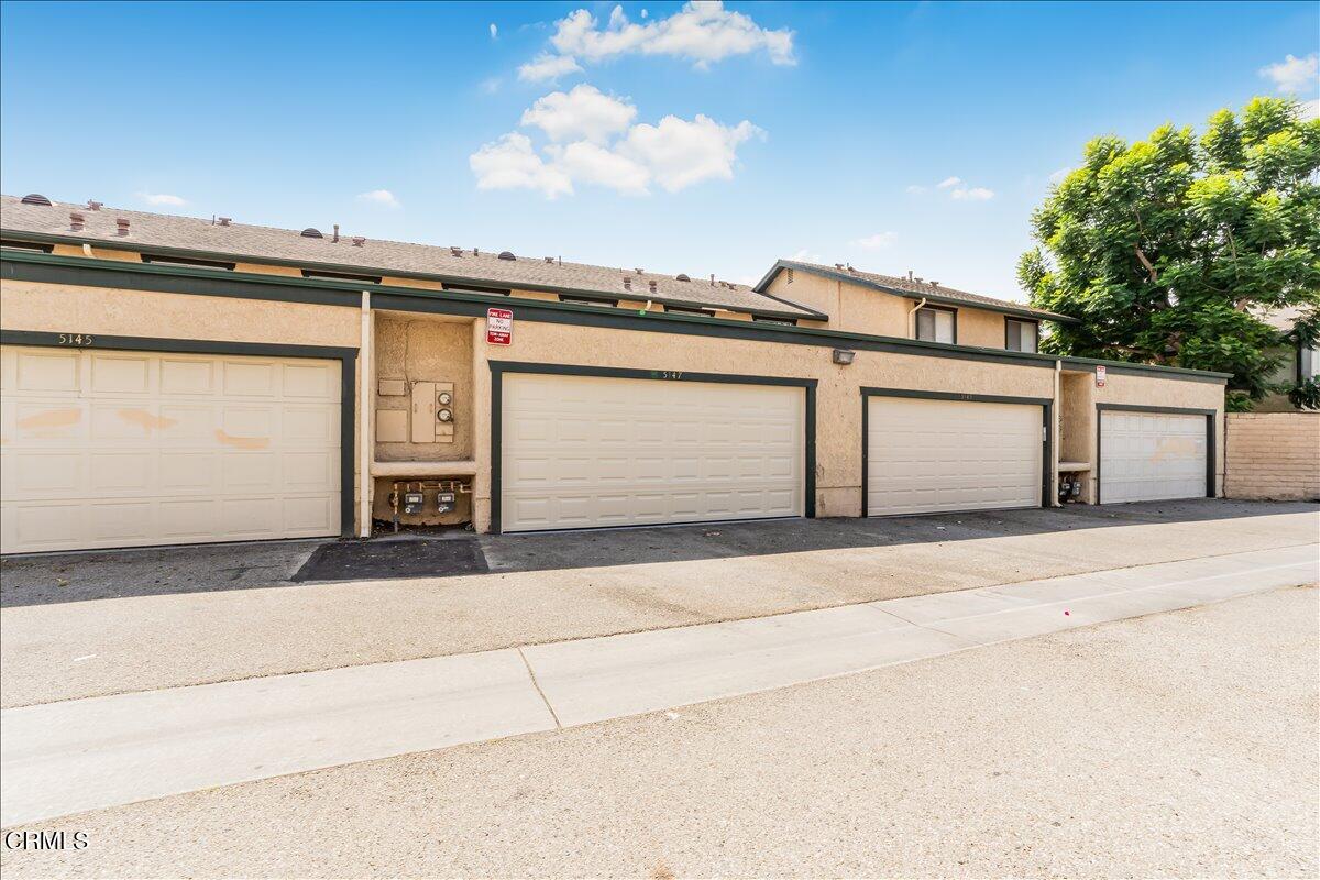 5147 Perkins Road Oxnard, CA 93033 - Photo 37 of 42 a view of a parking space with a car parked in front of it