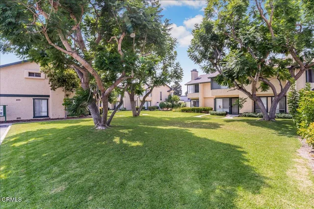 a house view with a garden space