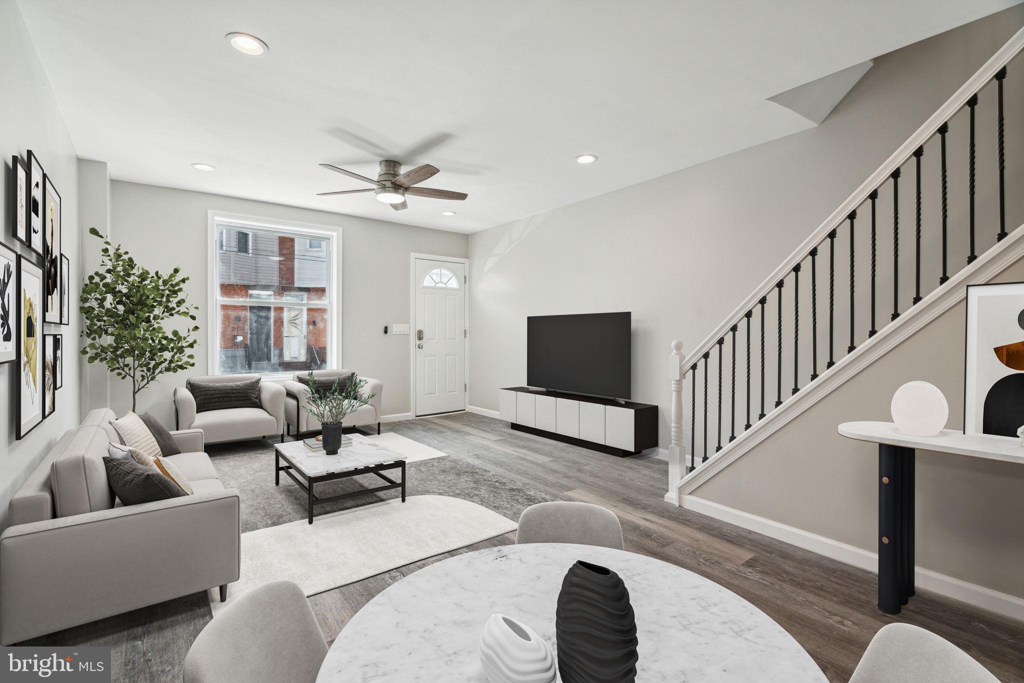 2033 Emily Street Philadelphia, PA 19145 - Photo 3 of 42 a living room with furniture and a flat screen tv