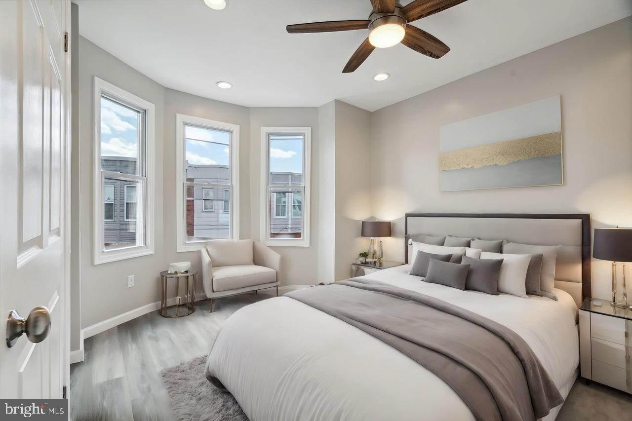 2033 Emily Street Philadelphia, PA 19145 - Photo 31 of 42 a bedroom with furniture and windows