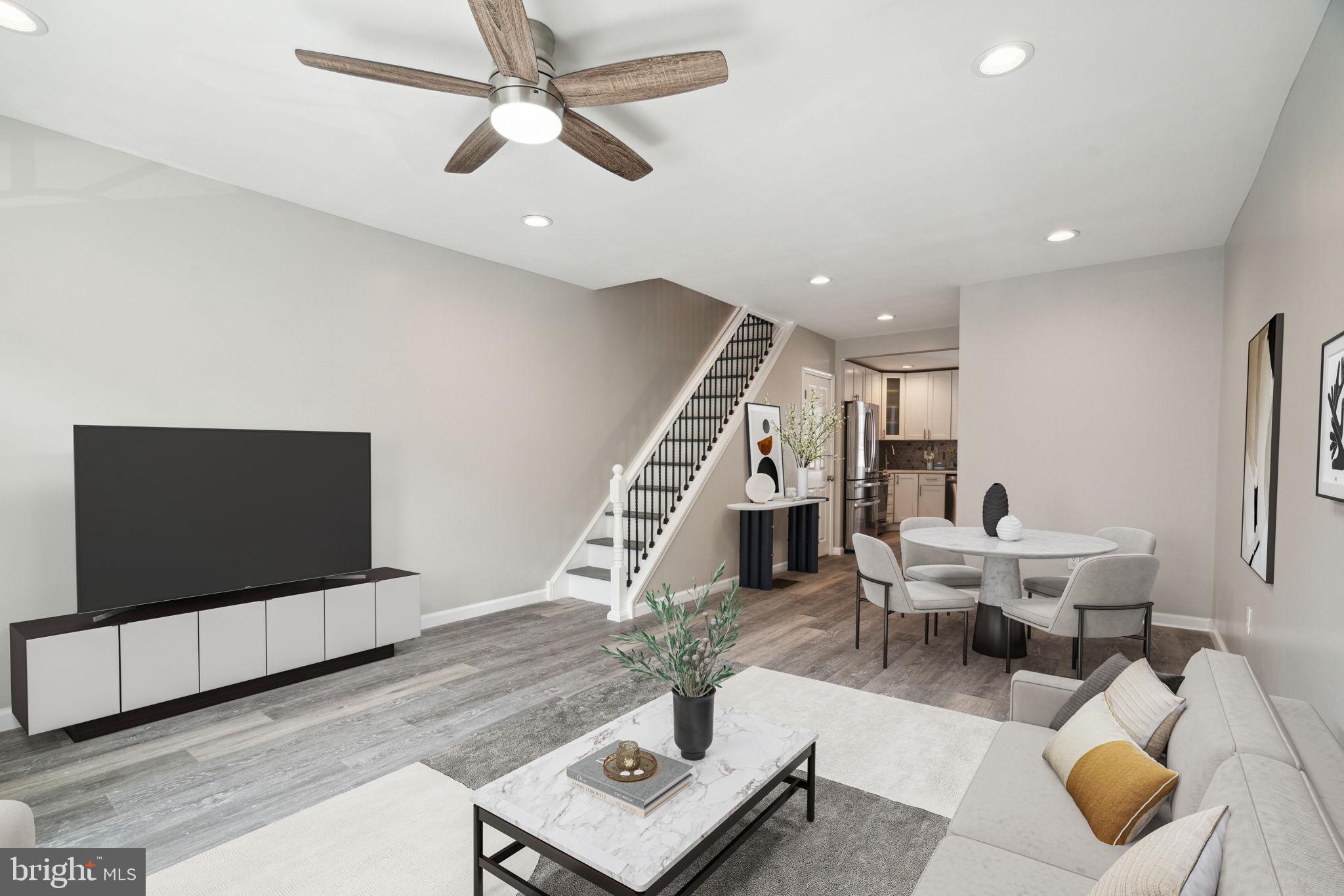 2033 Emily Street Philadelphia, PA 19145 - Photo 4 of 42 a living room with furniture and a flat screen tv