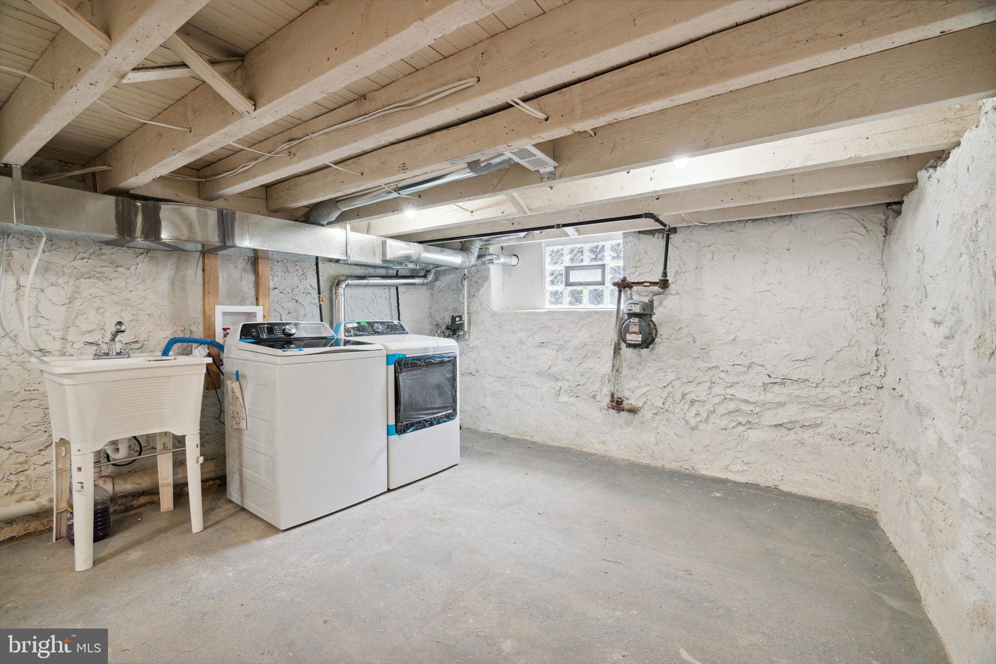 2033 Emily Street Philadelphia, PA 19145 - Photo 42 of 42 a utility room with cabinets