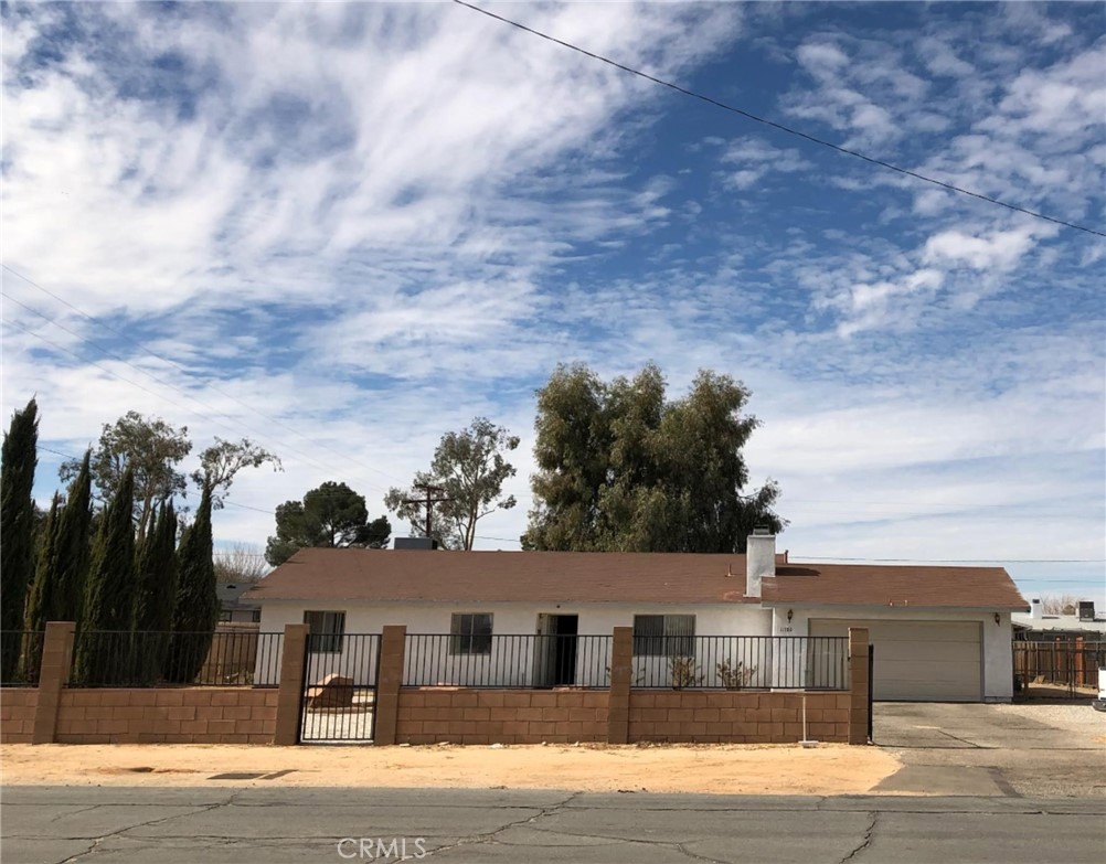 11780 Jamacha Road Apple Valley, CA 92308 - Photo 1 of 1 a view of house with outdoor space and street view