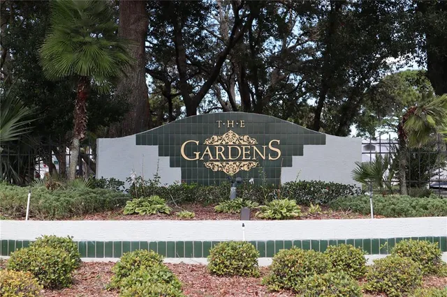 a sign that is next to a road