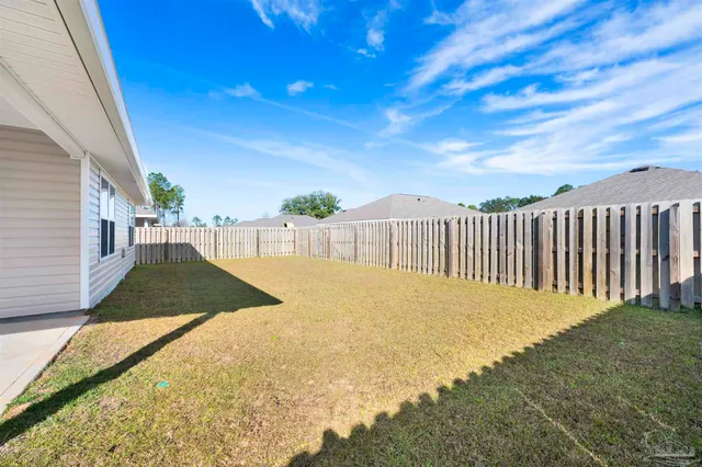 a view of backyard with a garden