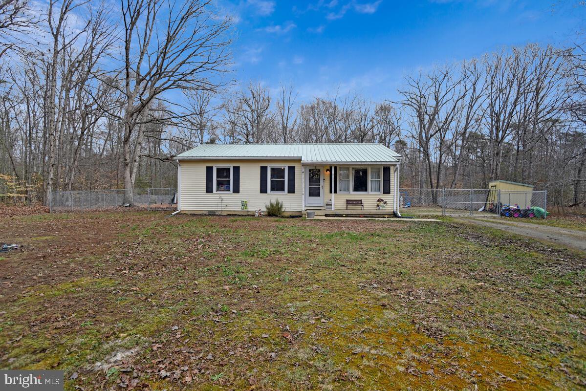 5850 Fire Tower Road Welcome, MD 20693 - Photo 2 of 23 a front view of a house with a yard