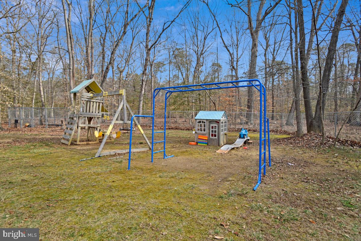 5850 Fire Tower Road Welcome, MD 20693 - Photo 21 of 23 a view of outdoor space with playground and tree