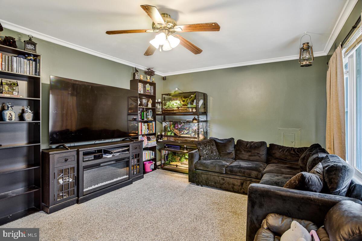 5850 Fire Tower Road Welcome, MD 20693 - Photo 4 of 23 a living room with furniture and a flat screen tv