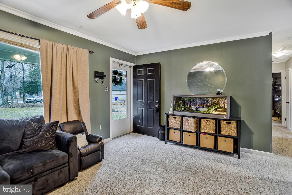 5850 Fire Tower Road Welcome, MD 20693 - Photo 5 of 23 a living room with furniture and a flat screen tv