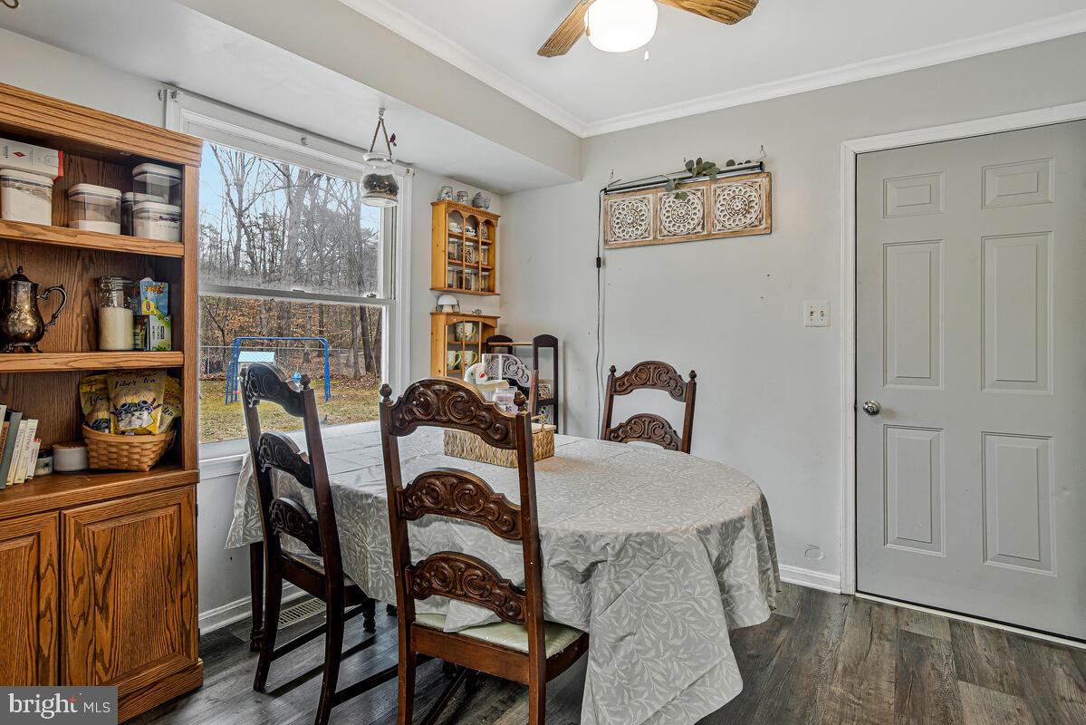 5850 Fire Tower Road Welcome, MD 20693 - Photo 9 of 23 a dining room with furniture and window