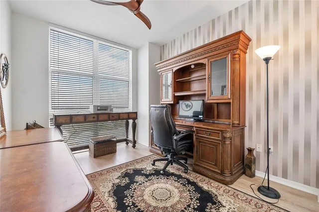 a workspace with furniture and window