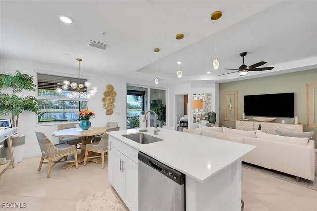 a view of a living room and dining room