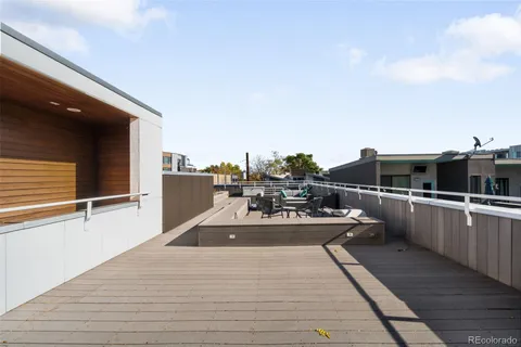 a view of a balcony with chairs