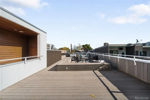 a view of a balcony with chairs