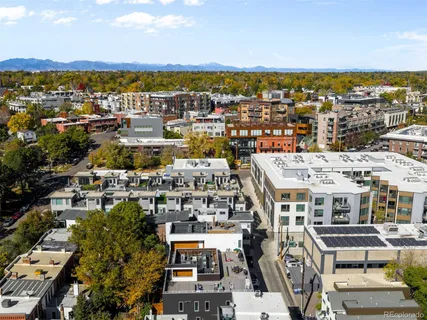a view of a city with mountains