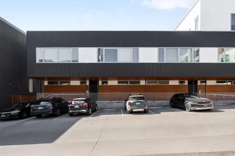 a car parked in parking area of building