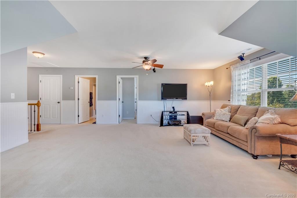 5303 Conant Circle Fort Mill, SC 29708 - Photo 20 of 37 a living room with furniture and a flat screen tv