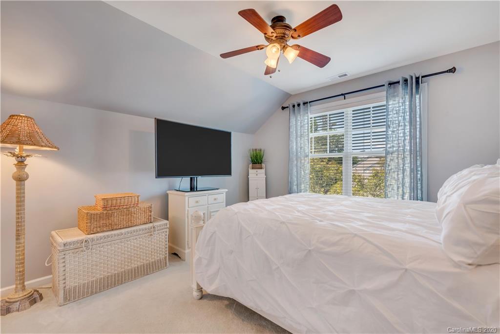 5303 Conant Circle Fort Mill, SC 29708 - Photo 21 of 37 a bedroom with a bed and a flat screen tv