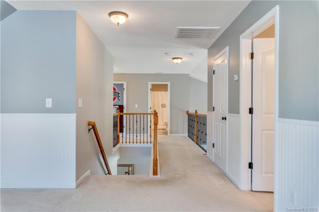 5303 Conant Circle Fort Mill, SC 29708 - Photo 22 of 37 a view of a hallway with a room and stairs