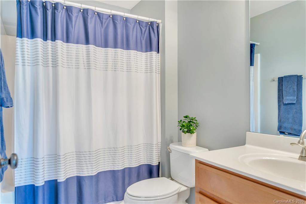 5303 Conant Circle Fort Mill, SC 29708 - Photo 26 of 37 a bathroom with a sink toilet and shower