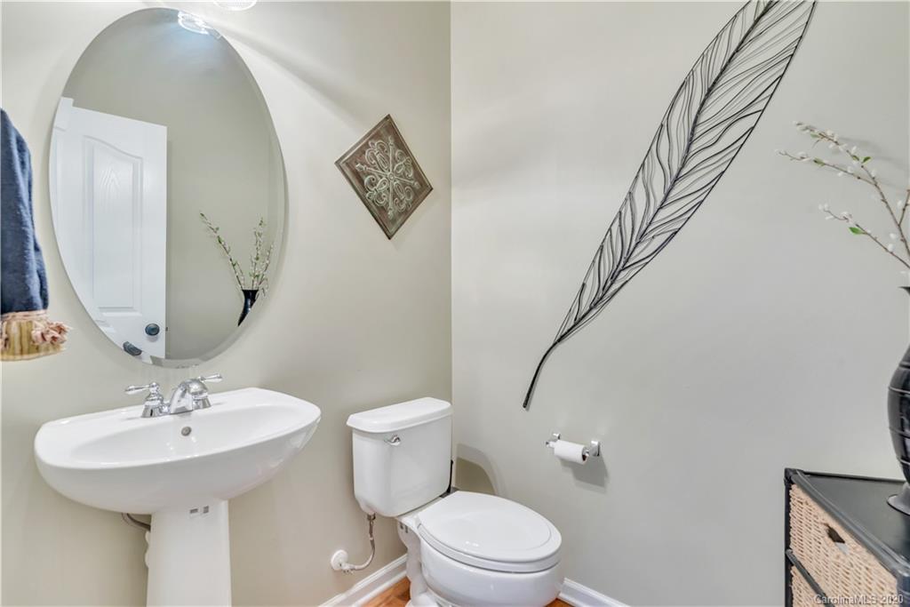 5303 Conant Circle Fort Mill, SC 29708 - Photo 27 of 37 a bathroom with a toilet sink and mirror