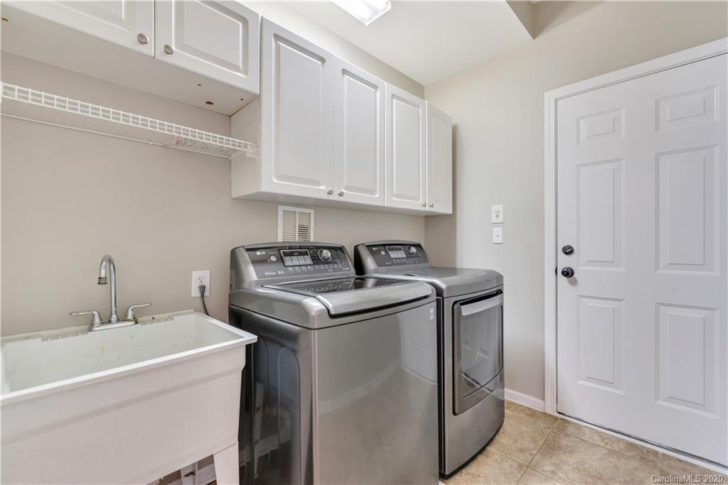 5303 Conant Circle Fort Mill, SC 29708 - Photo 28 of 37 a utility room with sink dryer and washer