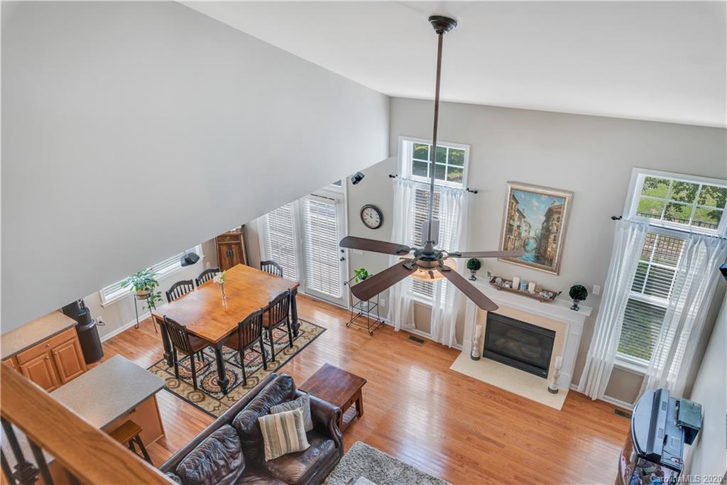 5303 Conant Circle Fort Mill, SC 29708 - Photo 29 of 37 a living room with furniture a fireplace and wooden floor