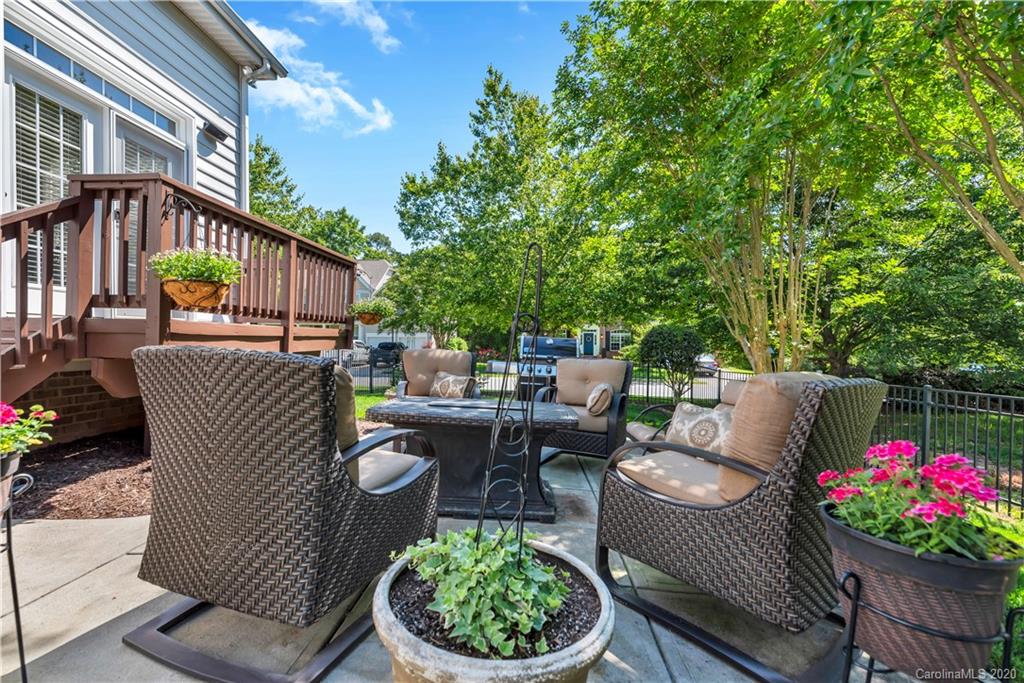 5303 Conant Circle Fort Mill, SC 29708 - Photo 30 of 37 a view of a patio with couches table and chairs and potted plants