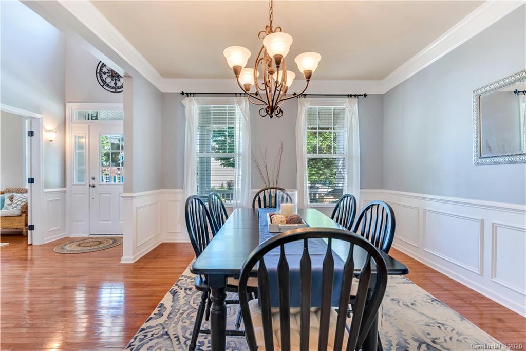 5303 Conant Circle Fort Mill, SC 29708 - Photo 8 of 37 a view of a dining room with furniture window and wooden floor