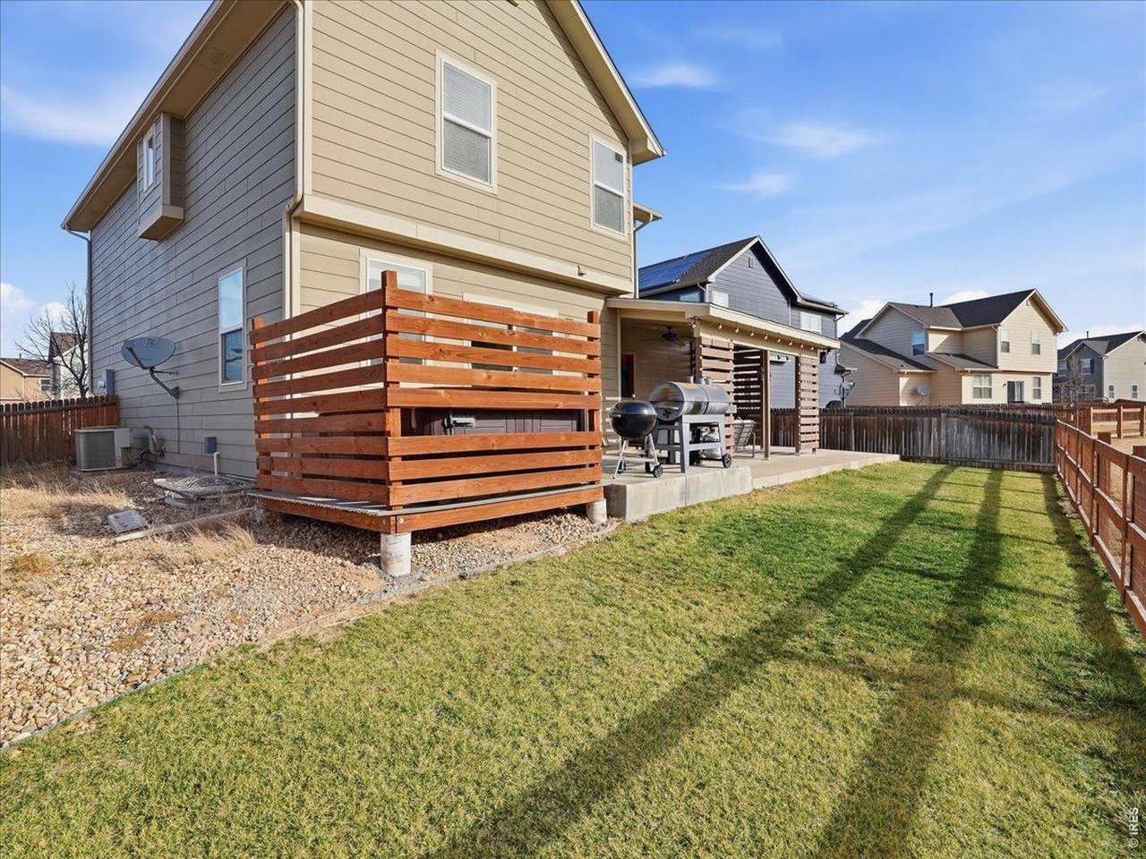 1565 Basildon Court Windsor, CO 80550 - Photo 26 of 36 a house view with a outdoor space